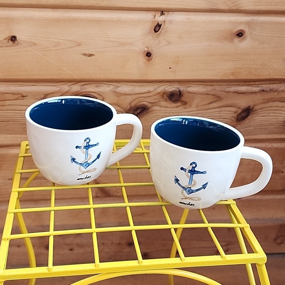 Set of lg coffee cups with blue anchor on the front